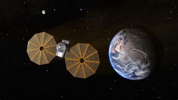 
NASA Spacecraft Named Lucy Skims Earth’s Atmosphere on Its Way to Explore Asteroids Orbiting Jupiter 